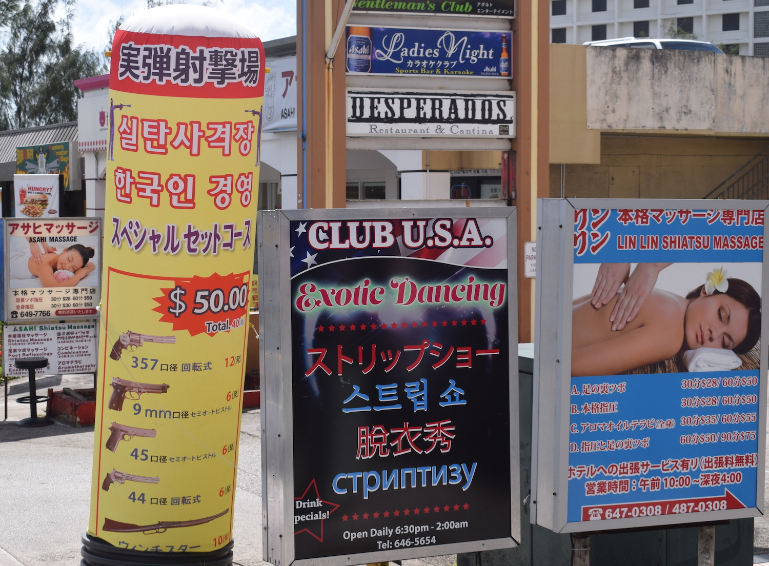 Adverts for guns and strippers in Guam