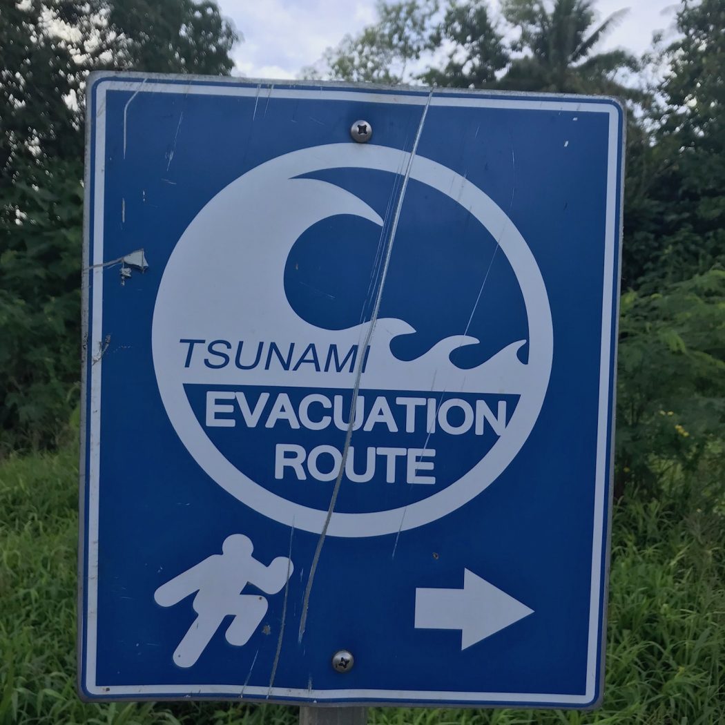 Micronesian road sign saying Tsunami Evacuation Route