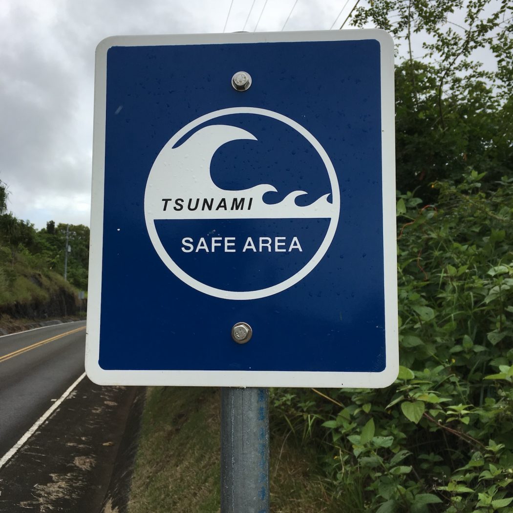 Micronesian road sign saying Tsunami Evacuation Safe Area